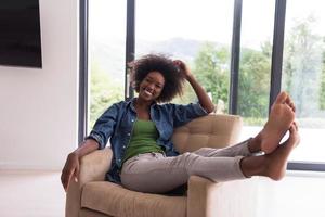 black women at home in the chair photo