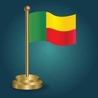 Benin national flag on golden pole on gradation isolated dark background. table flag, vector illustration