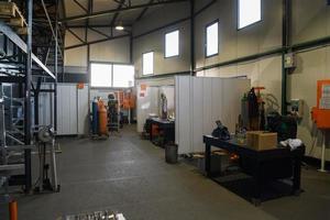 modern industrial factory for mechanical engineering equipment and machines manufacture of a production hall photo