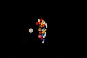 pills on black photo