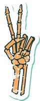 distressed sticker tattoo style icon of a skeleton hand giving a peace sign vector