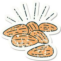 worn old sticker of a tattoo style almonds vector