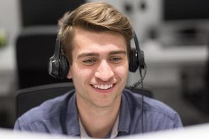 male call centre operator doing his job photo