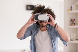 man using VR-headset glasses of virtual reality photo