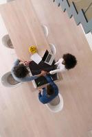top view of Multiethnic startup business team on meeting photo