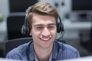 male call centre operator doing his job photo