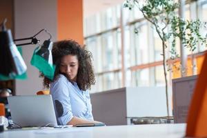 young  business woman at office photo