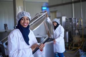 business woman team in local  cheese production company photo