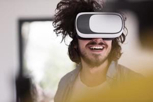 man using VR-headset glasses of virtual reality photo