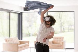 man using VR-headset glasses of virtual reality photo