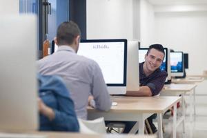 startup business, software developer working on desktop computer photo