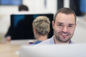 startup business, software developer working on desktop computer photo