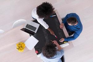 top view of Multiethnic startup business team on meeting photo