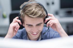 male call centre operator doing his job photo