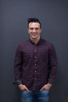 portrait of young startup business man in plaid shirt photo