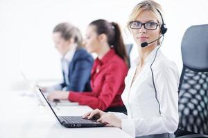 business woman group with headphones photo