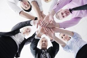 business people group joining hands photo