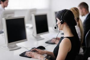 business people group working in customer and help desk office photo