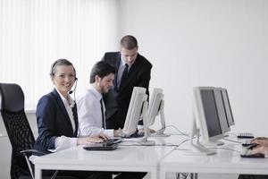 business people group working in customer and help desk office photo