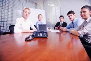 business people in a video meeting photo