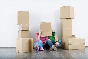 Young couple moving in new house photo