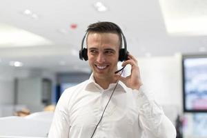 male call centre operator doing his job photo