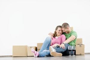 Young couple moving in new house photo