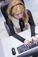 female call centre operator doing her job top view photo