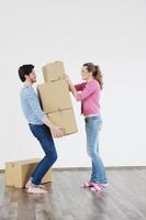 Young couple moving in new home photo