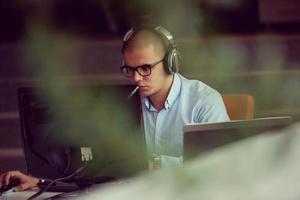 startup business, software developer working on computer photo