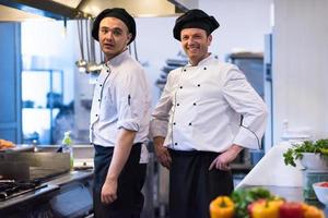 Portrait of two chefs photo