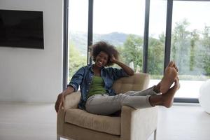 black women at home in the chair photo