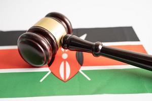 Kenya flag with gavel for judge lawyer. Law and justice court concept. photo