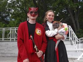 St Petersburg, Russia, 2022 - Dogs dressed up for the fashion show at Petshop Days festival photo