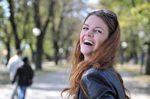 Happy young woman smiling photo