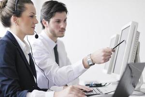 business people group working in customer and help desk office photo