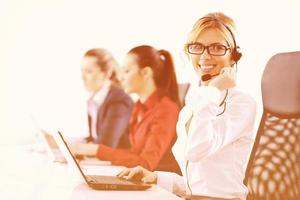 business woman group with headphones photo