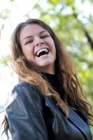 Happy young woman smiling photo