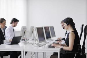 business people group working in customer and help desk office photo