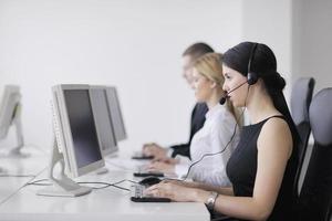 business people group working in customer and help desk office photo