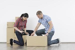 Young couple moving in new home photo