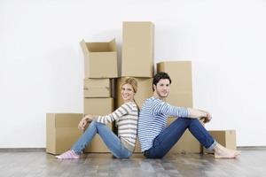 Young couple moving in new home photo