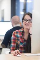 startup business, woman  working on desktop computer photo