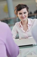 young business woman on meeting photo