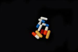 pills on black photo