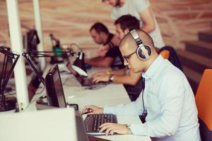 startup business, software developer working on computer photo
