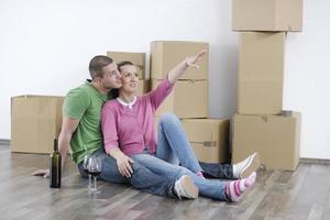 Young couple moving in new home photo