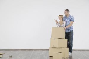 Young couple moving in new home photo