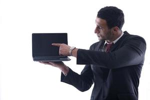 el hombre de negocios trabaja en una mini laptop foto