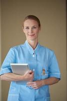 female doctor with tablet computer photo